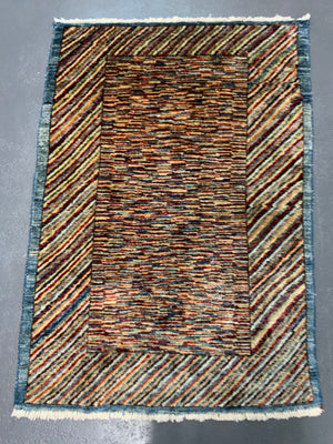 Modern Chobi flecked pile small rug  (124 x 95cm)