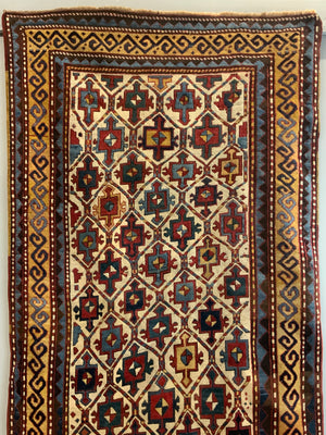 Caucasian antique Kazak rug (273 x 144cm)