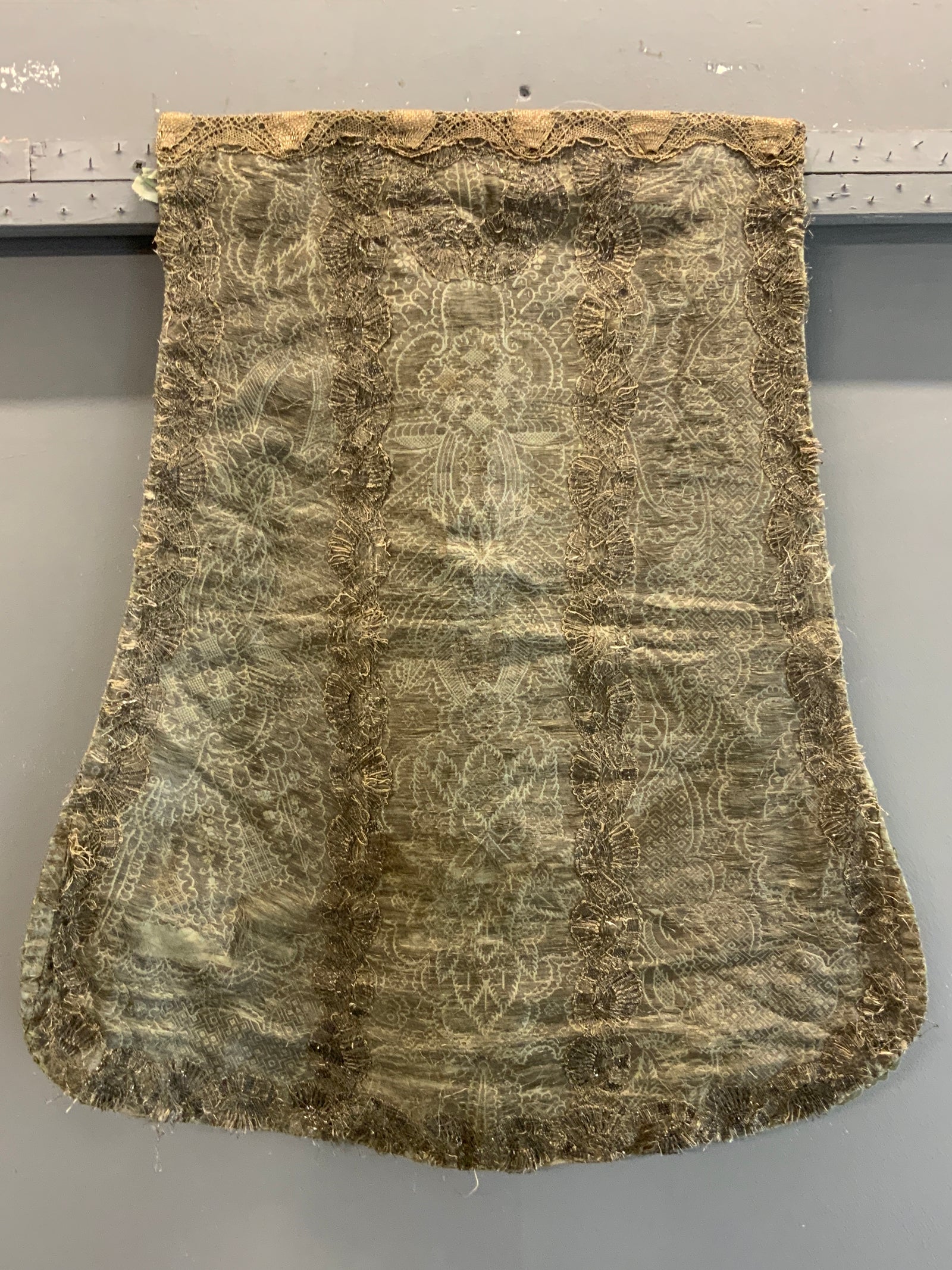 Antique Chasuble with heavy silver brocading (74 x 64)