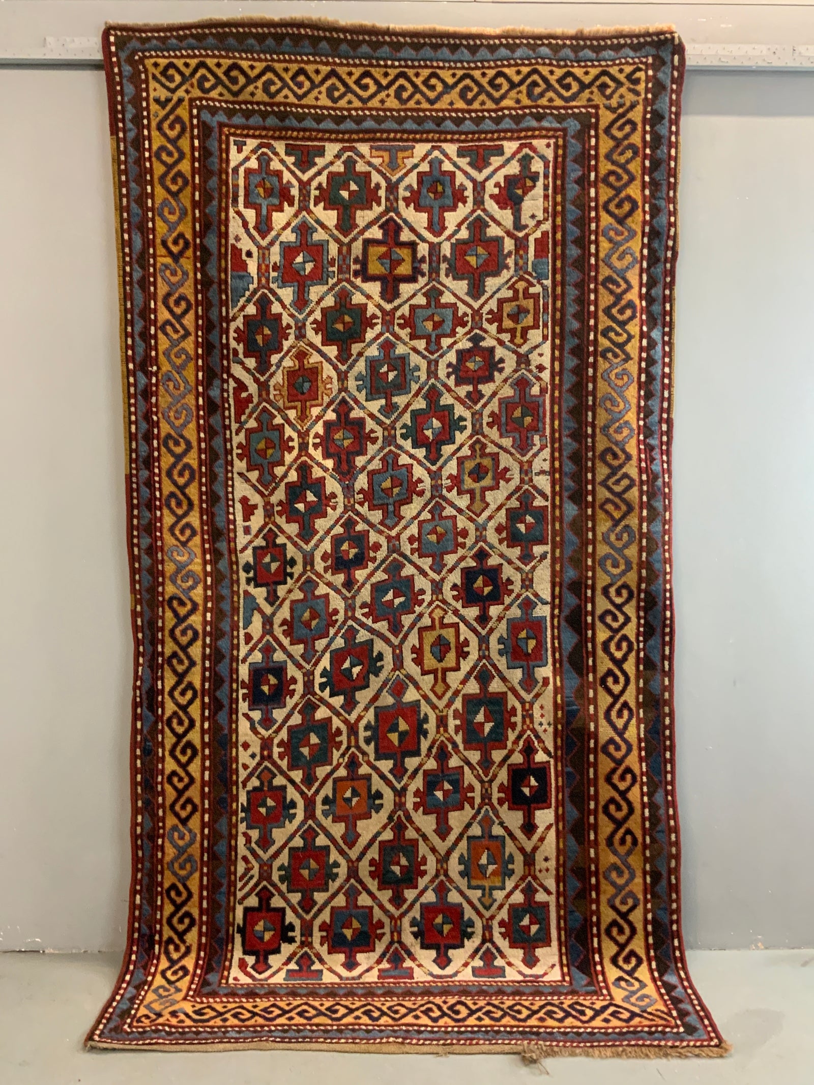 Caucasian antique Kazak rug (273 x 144cm)