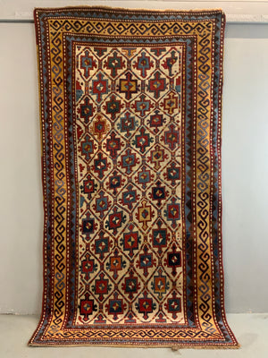 Caucasian antique Kazak rug (273 x 144cm)
