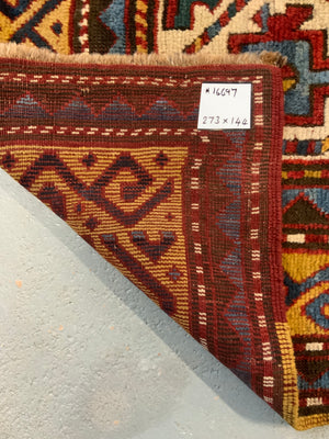 Caucasian antique Kazak rug (273 x 144cm)