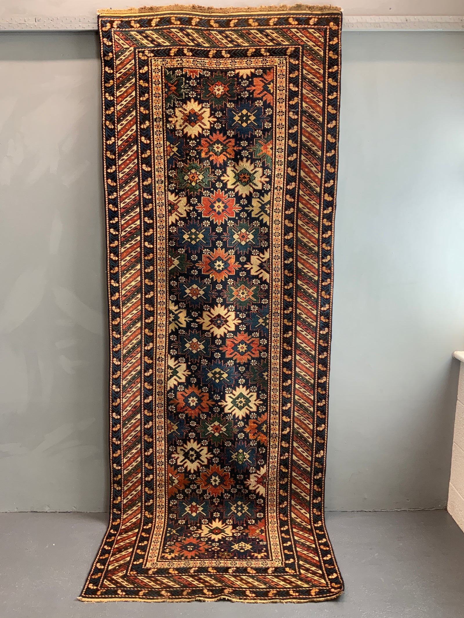 Caucasian antique Shirvan blossom type long rug (292 x 108cm)