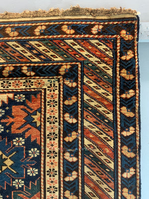 Caucasian antique Shirvan blossom type long rug (292 x 108cm)