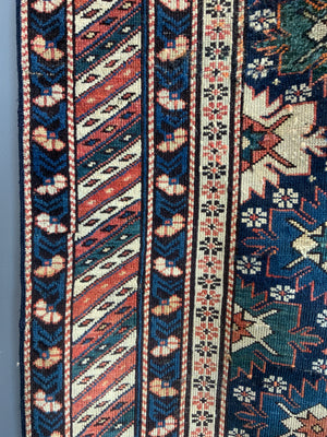 Caucasian antique Shirvan blossom type long rug (292 x 108cm)