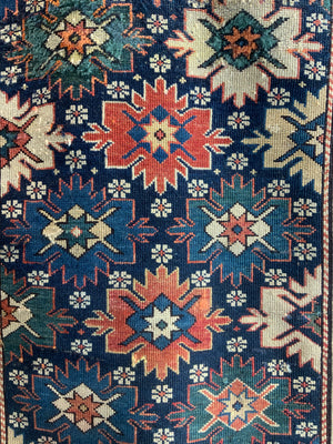 Caucasian antique Shirvan blossom type long rug (292 x 108cm)