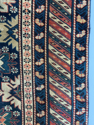 Caucasian antique Shirvan blossom type long rug (292 x 108cm)