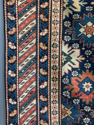 Caucasian antique Shirvan blossom type long rug (292 x 108cm)