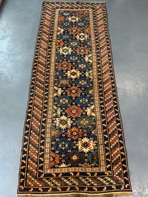 Caucasian antique Shirvan blossom type long rug (292 x 108cm)