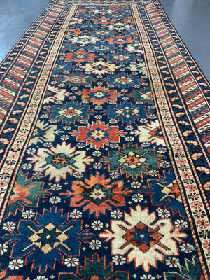 Caucasian antique Shirvan blossom type long rug (292 x 108cm)