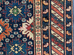 Caucasian antique Shirvan blossom type long rug (292 x 108cm)