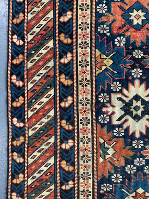Caucasian antique Shirvan blossom type long rug (292 x 108cm)