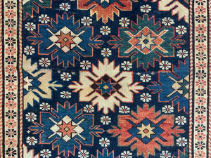 Caucasian antique Shirvan blossom type long rug (292 x 108cm)