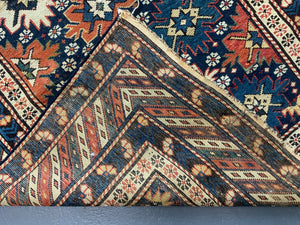 Caucasian antique Shirvan blossom type long rug (292 x 108cm)