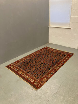 Afshar antique rug with paisley boteh design (212 x 135cm)