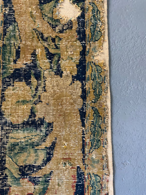 A Louis XIV Savonnerie carpet fragment (105 x 64cm)