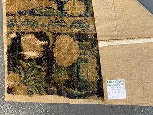 A Louis XIV Savonnerie carpet fragment (105 x 64cm)