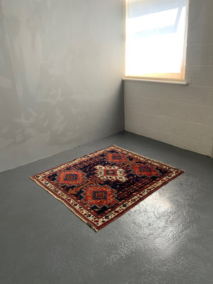 Afshar antique rug (122 x 115cm)