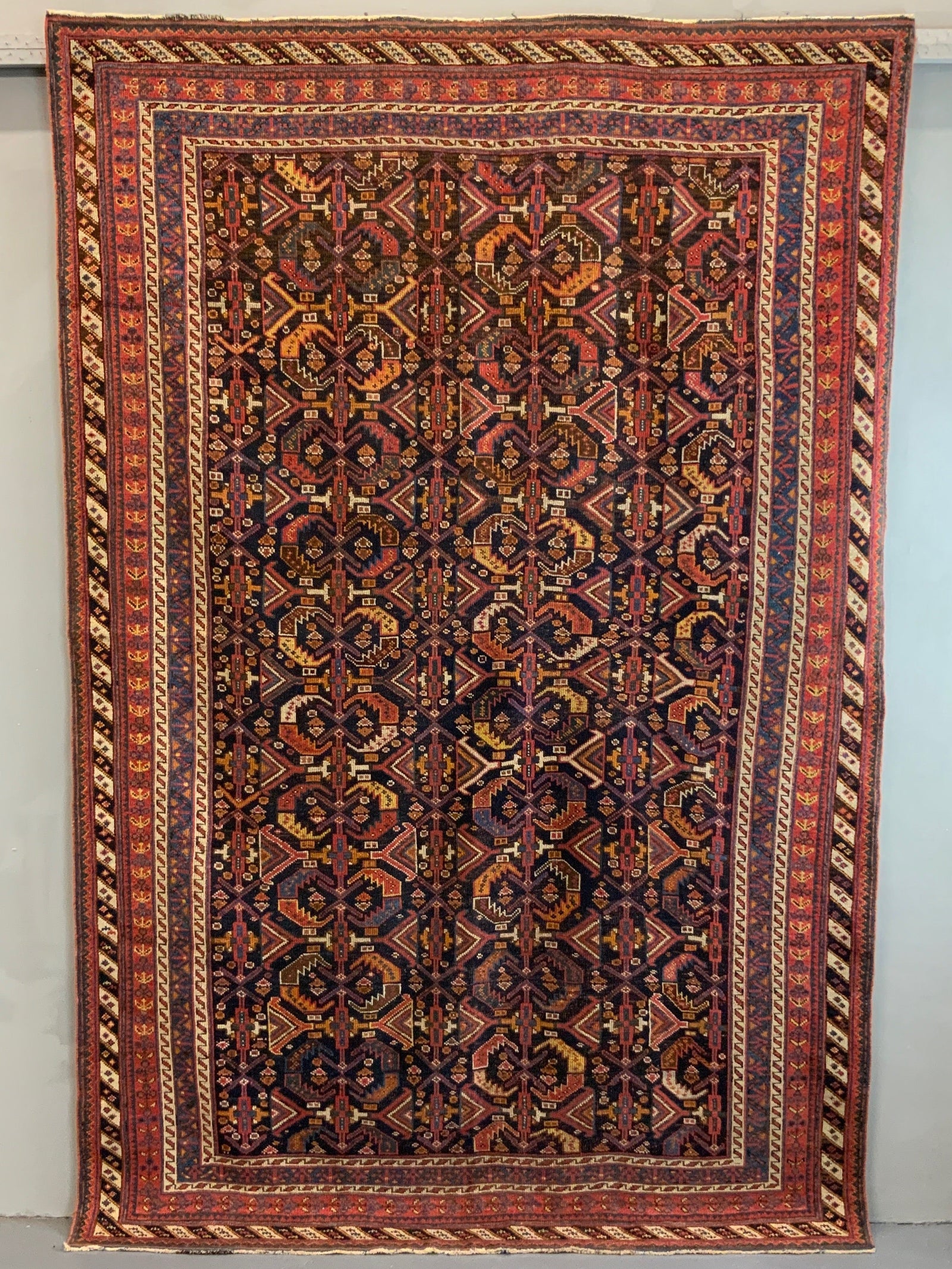 Afshar antique rug with all over design (243 x 162cm)