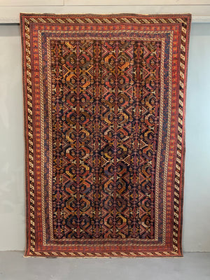 Afshar antique rug with all over design (243 x 162cm)
