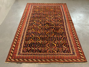 Afshar antique rug with all over design (243 x 162cm)