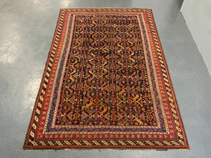 Afshar antique rug with all over design (243 x 162cm)