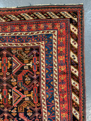 Afshar antique rug with all over design (243 x 162cm)
