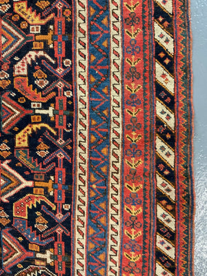 Afshar antique rug with all over design (243 x 162cm)