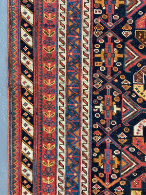Afshar antique rug with all over design (243 x 162cm)