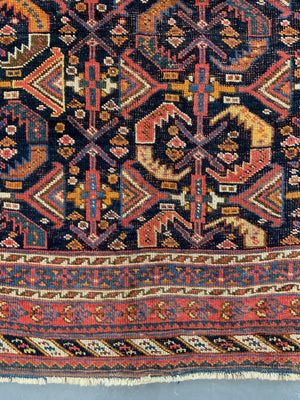 Afshar antique rug with all over design (243 x 162cm)