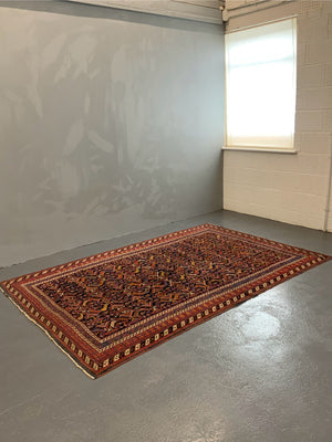 Afshar antique rug with all over design (243 x 162cm)