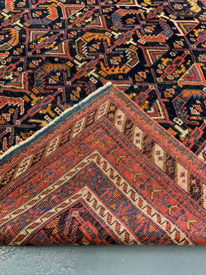Afshar antique rug with all over design (243 x 162cm)