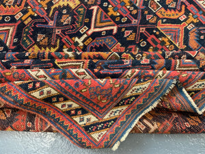 Afshar antique rug with all over design (243 x 162cm)