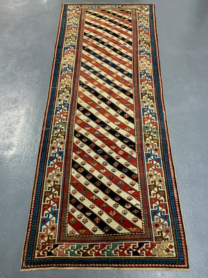 Caucasian antique fine long rug / runner (284 x 114cm)