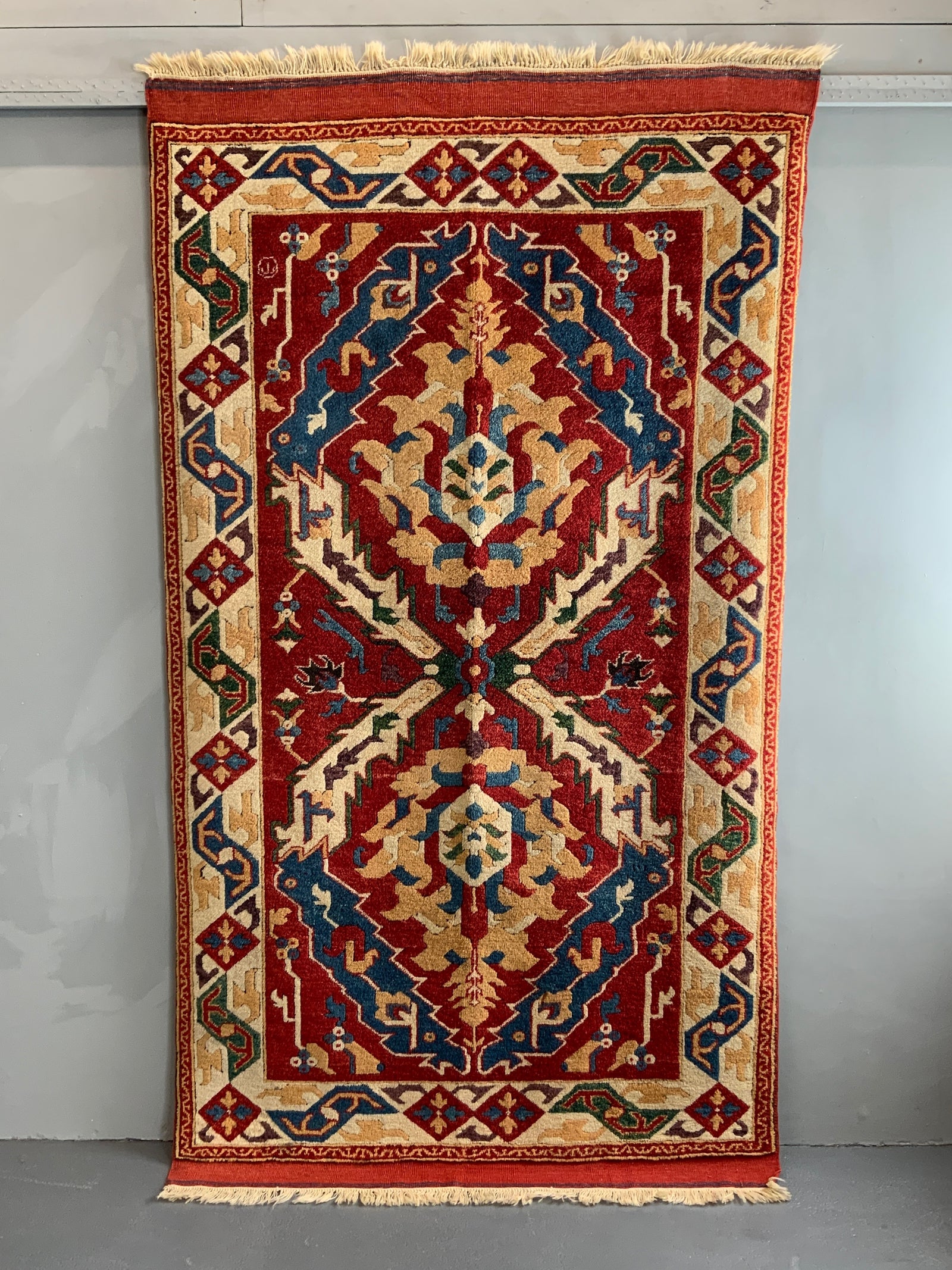 Turkish vintage signed Tolga Tolu rug (245 x 137cm)