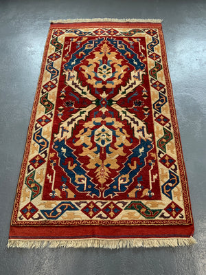 Turkish vintage signed Tolga Tolu rug (245 x 137cm)