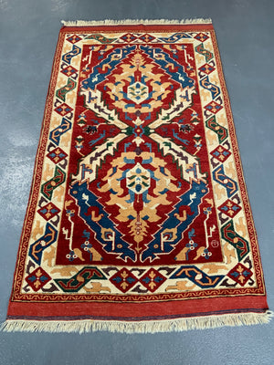 Turkish vintage signed Tolga Tolu rug (245 x 137cm)