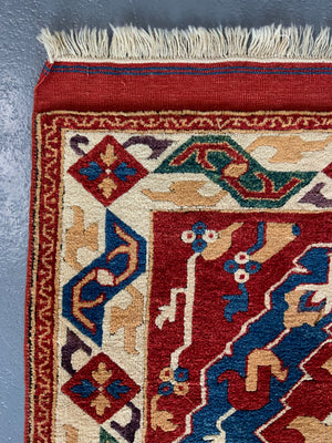 Turkish vintage signed Tolga Tolu rug (245 x 137cm)