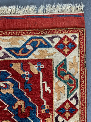 Turkish vintage signed Tolga Tolu rug (245 x 137cm)