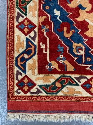Turkish vintage signed Tolga Tolu rug (245 x 137cm)
