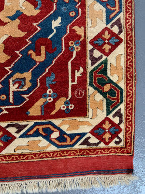 Turkish vintage signed Tolga Tolu rug (245 x 137cm)