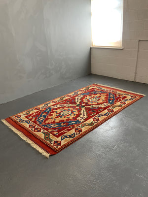 Turkish vintage signed Tolga Tolu rug (245 x 137cm)