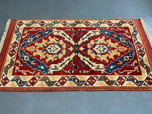 Turkish vintage signed Tolga Tolu rug (245 x 137cm)
