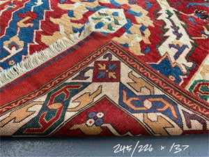 Turkish vintage signed Tolga Tolu rug (245 x 137cm)