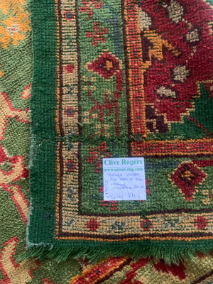 Turkish antique Edwardian Ushak cut and shut rug (219 x 179cm)