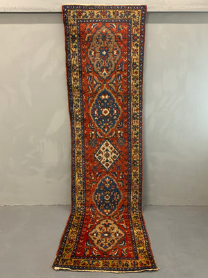 NWP vintage red ground runner with five medallions (334 x 92cm)