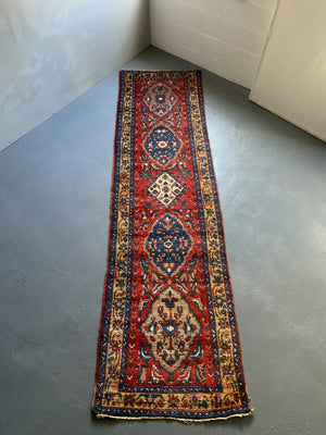 NWP vintage red ground runner with five medallions (334 x 92cm)