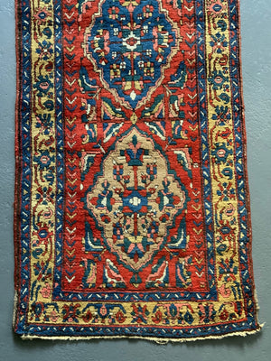NWP vintage red ground runner with five medallions (334 x 92cm)