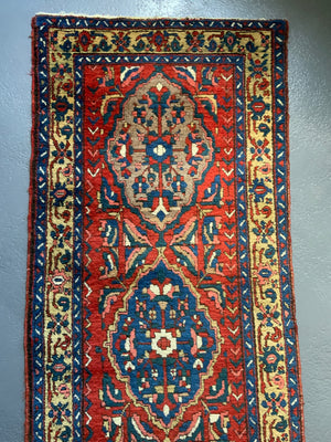 NWP vintage red ground runner with five medallions (334 x 92cm)