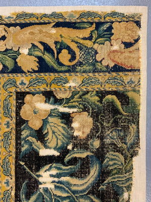 A Louis XIV Savonnerie carpet fragment (153 x 87cm)
